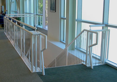 Stainless steel interior stair railings fabricated by DYCO Industries